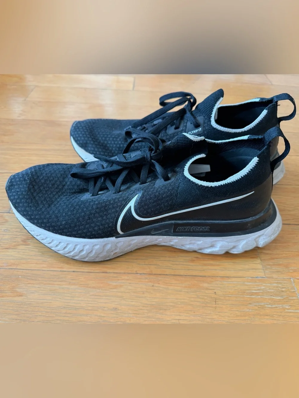 Nike Men's React Flyknit Black and White Running Shoes